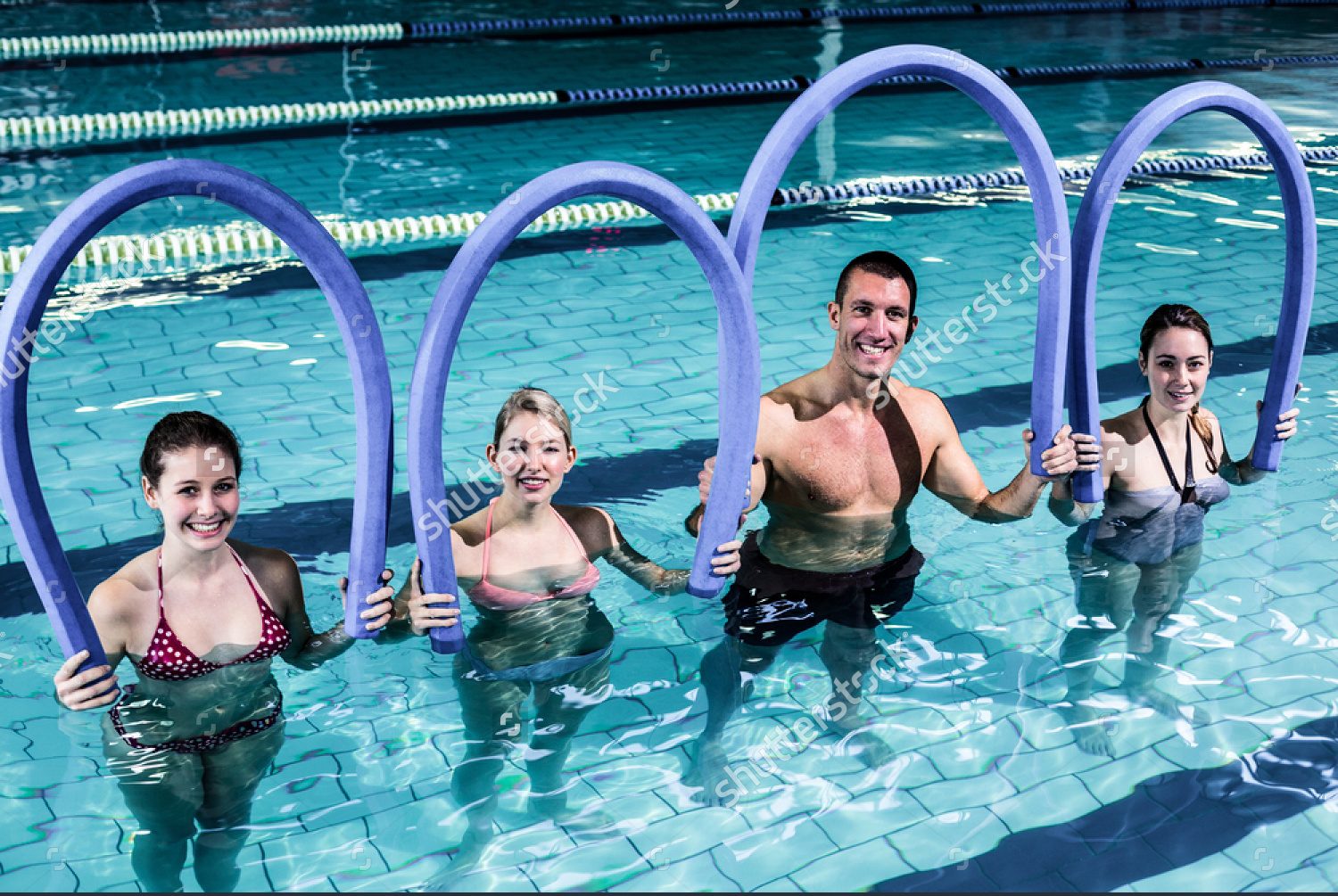 stock-photo-fit-group-doing-aerobical-excercises-in-swimming-pool-369437936